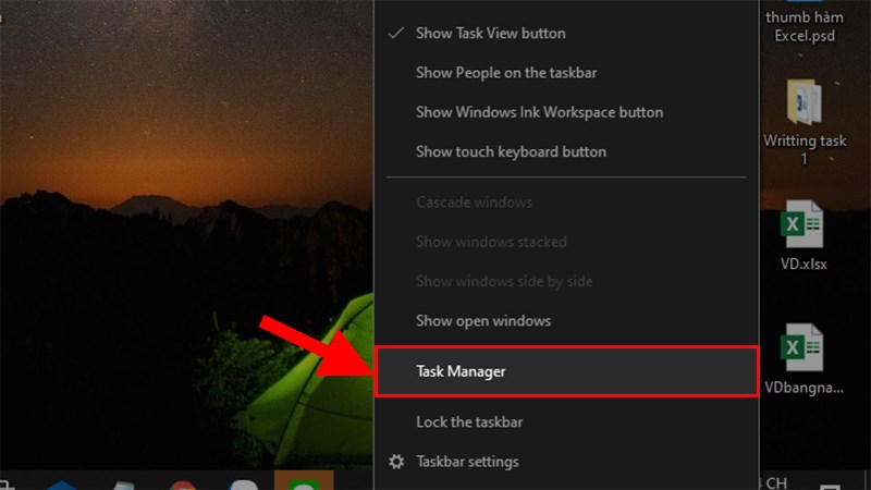 Right click on the Taskbar > Select Task Manager.